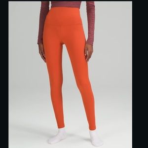 lululemon Align™ Super-High-Rise Pant 28".  Never worn. Size 4. Canyon Orange.